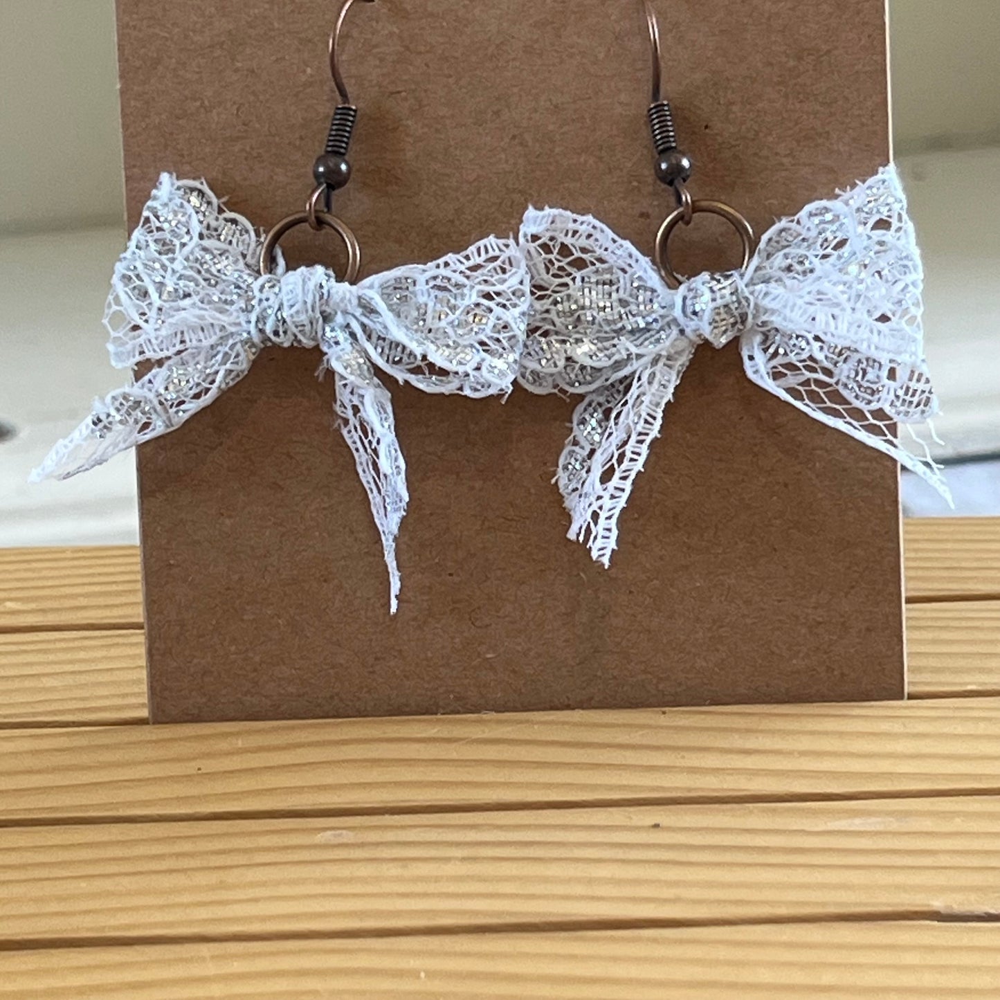 Vintage lace earrings metallic silver and white bow earrings