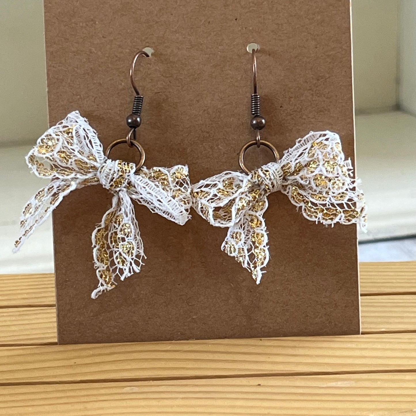 Vintage lace earrings metallic gold and white bow earrings
